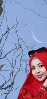 Woman in red hijab with moonlit branch background wallpaper.