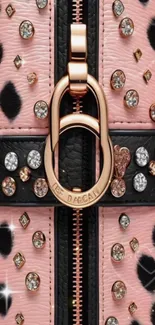 Leopard print with jewels and zipper on pink background.