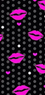 Mobile wallpaper with pink lips and polka dots on a black background.