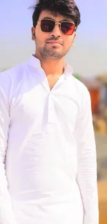 Stylish man with sunglasses in white shirt.