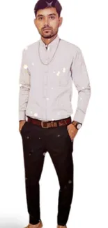 Stylish man standing on a white background in formal wear.