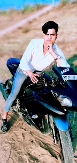 Stylish man poses on a sleek motorcycle outdoors.