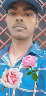 Stylish man with pink roses and blue checkered shirt wallpaper