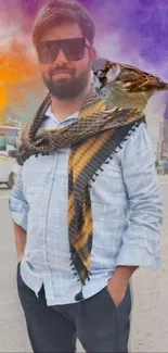 Man with scarf and sparrow against colorful clouds.