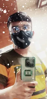 Artistic masked selfie with smartphone reflection in a modern style.