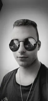 Monochrome portrait with reflective sunglasses, gray theme.