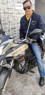 Man in sunglasses on a stylish motorcycle.