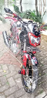 Sleek motorcycle parked in rain on a cobblestone street, vivid red accents.