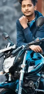 Young man posing on a blue motorcycle with a blurred background.