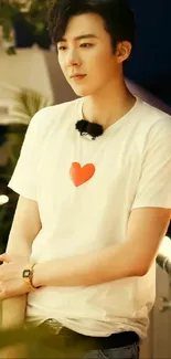 Stylish man in white shirt against dark night backdrop.