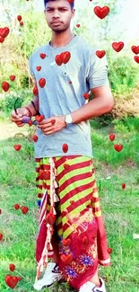 Man in stylish outfit standing in green nature.