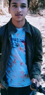 Stylish young man in outdoor setting with natural background.