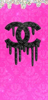 Bright pink wallpaper with black dripping logo and glitter accents.