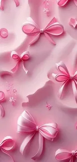 Pink ribbons and bows on a pastel background.