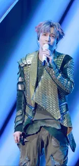 Energetic pop performance with stylish blue and green outfit.