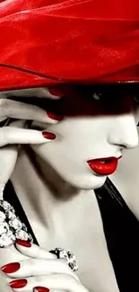 Stylish woman in red hat and nails, black and white portrait.