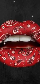 Red lips with paisley patterns on dark backdrop.