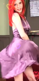 Redhead twirling in a shimmering purple dress with heart accents.