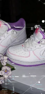 White sneakers with purple accents and flowers design.