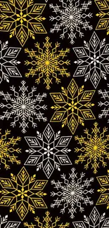 Intricate snowflake pattern on black background with yellow and white designs.