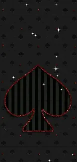 Black wallpaper with elegant spade design in red accents for phone background.