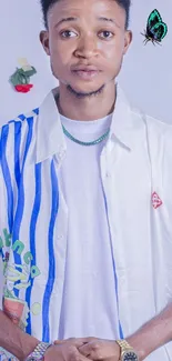 Young man in blue striped shirt with a white background.