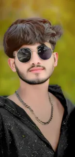 Portrait of a young man wearing sunglasses on a vibrant green background.