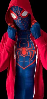 Superhero in blue and red suit with a hoodie, striking a dynamic pose.