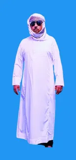 Person in traditional attire on blue background.