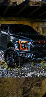 Black truck parked under a bridge, showcasing rugged design and adventure.