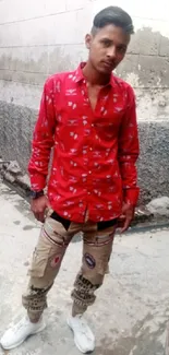 Stylish urban fashion look with red shirt.