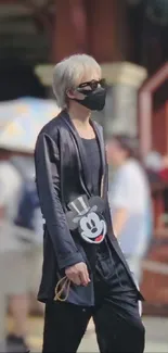 Urban fashion style with Mickey Mouse bag.