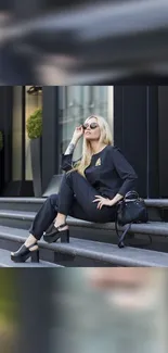 Chic and stylish woman sitting in urban setting.