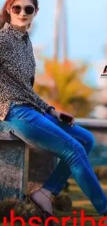 Fashionable woman sitting in leopard print and blue jeans.