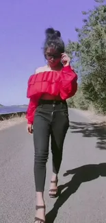 Woman in vibrant outfit walking outdoors