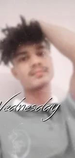 Blurry casual photo with Wednesday text.