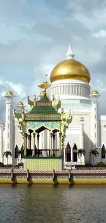 Sultan Omar Ali Saifuddien Mosque with golden dome under cloudy sky.