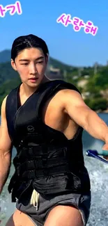 Man in life vest enjoying summer on water with vibrant landscape.