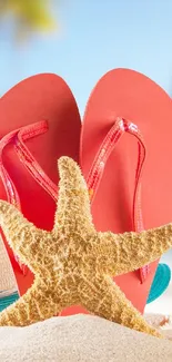 Red sandals and starfish on sandy beach under a clear sky.