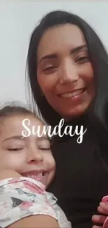 Mother and daughter sharing a Sunday smile