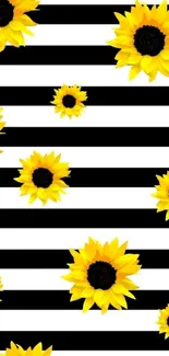 Yellow sunflowers on black and white stripes wallpaper.