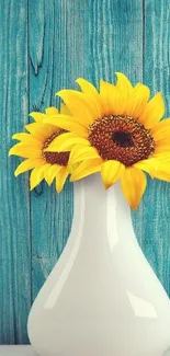 Vibrant wallpaper of sunflowers in a white vase with a blue wooden background.