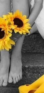 Monochrome wallpaper with yellow sunflowers and shoes.