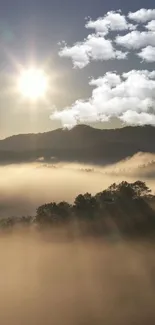 Sunlit mountain with fog and clouds, serene view.