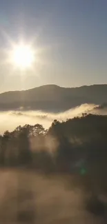 Misty mountain landscape with sunrise, serene view.