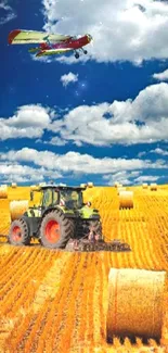 Tractor and hay bales under a blue sky in a golden field.