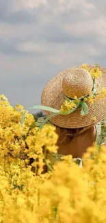 Woman in hat in sunny yellow flower field