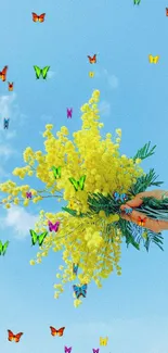 Vibrant yellow flowers against a bright blue sky wallpaper.