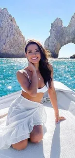 Woman on a boat enjoying sunny sea view.