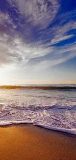 Beautiful beach sunrise with ocean waves and vibrant sky.